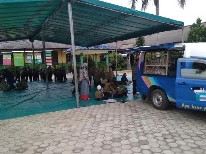 THE OPERATION OF MOBILE LIBRARY AT STKIP MUHAMMADIYAH, MANGKOL, PANGKALAN BARU SUB DISTRICT