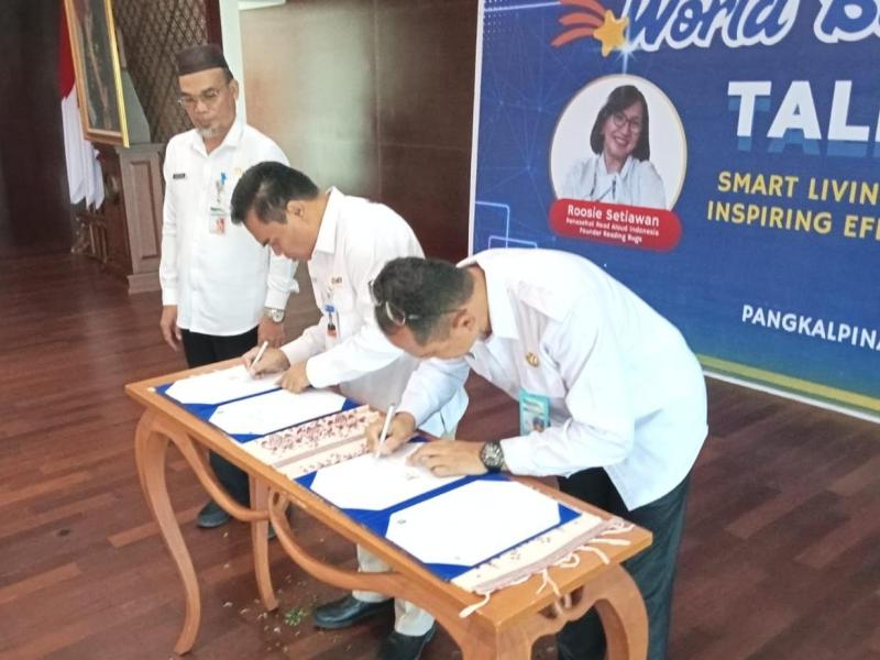 Plt. Kepala DKPUS Bersama Kepala Bank Indonesia Babel Tandatangani PKS